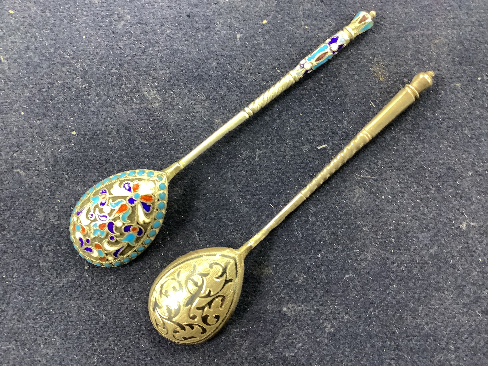 A group of Russian style metalware and a silver and enamel basket
